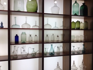 A collection of glass bottles and jars